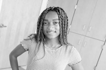 Girl smiling in exam rom