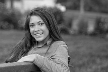 Teenage Girl on Park Bench