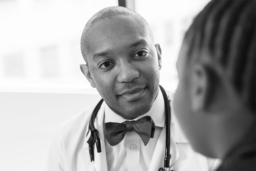 Doctor listening to patient