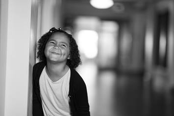 School aged girl smiling