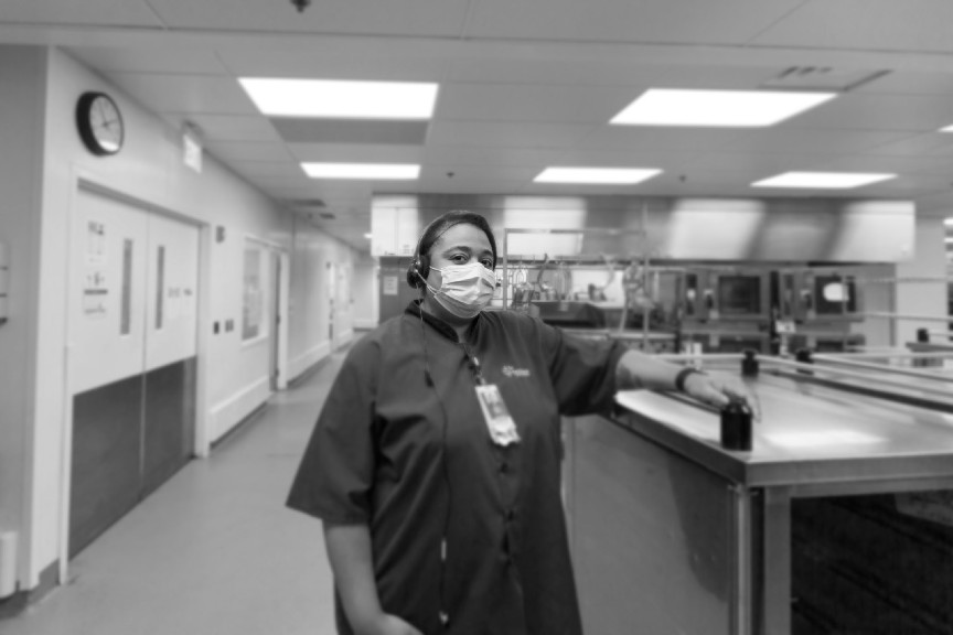 Barbara is shown wearing a mask and a headset at Nationwide Children's.