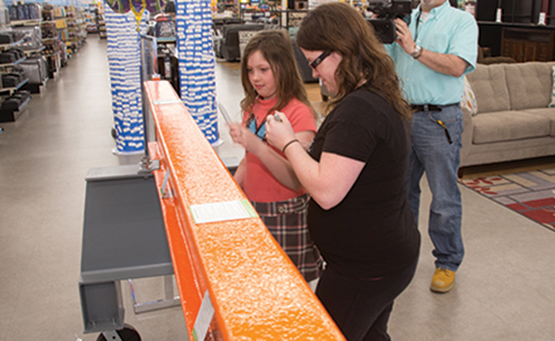 Signing the Pavilion beams