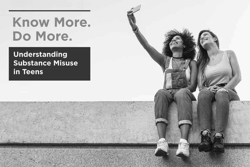 Two teens are seated, smiling and taking a selfie. The text box on the image reads, "Know More Do More: Understanding Substance Misuse in Teens"
