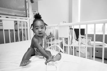 A toddler being seen at a hospital
