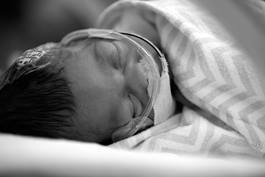 NICU Baby in Isolette