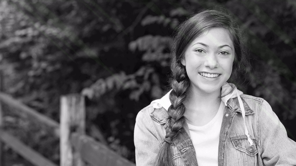 Young woman smiling at the camera